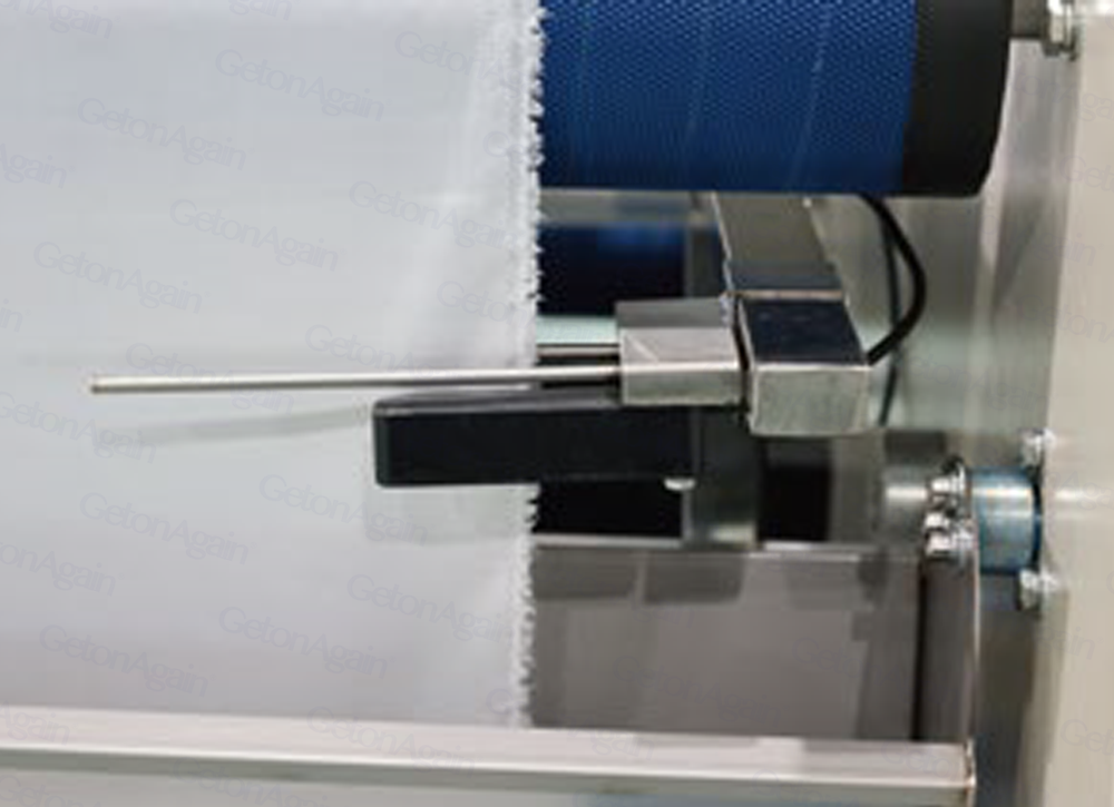 吹风式自动对边松布机